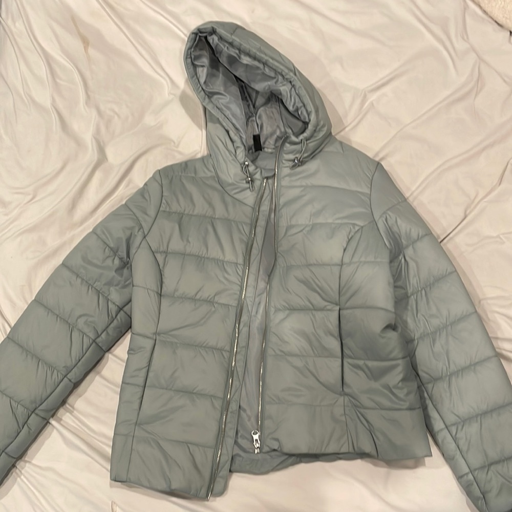 Undivided turquoise puffer jacket